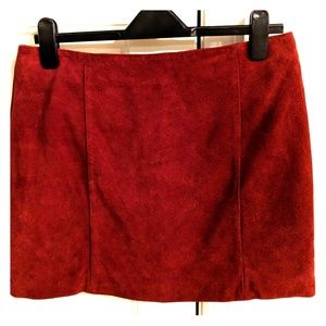 Red suede mini skirt